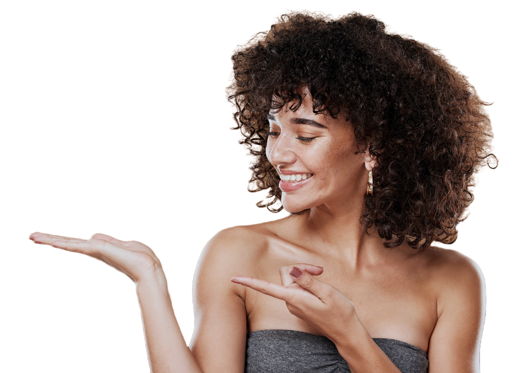 pretty woman smiling with curly hair pointing to the left